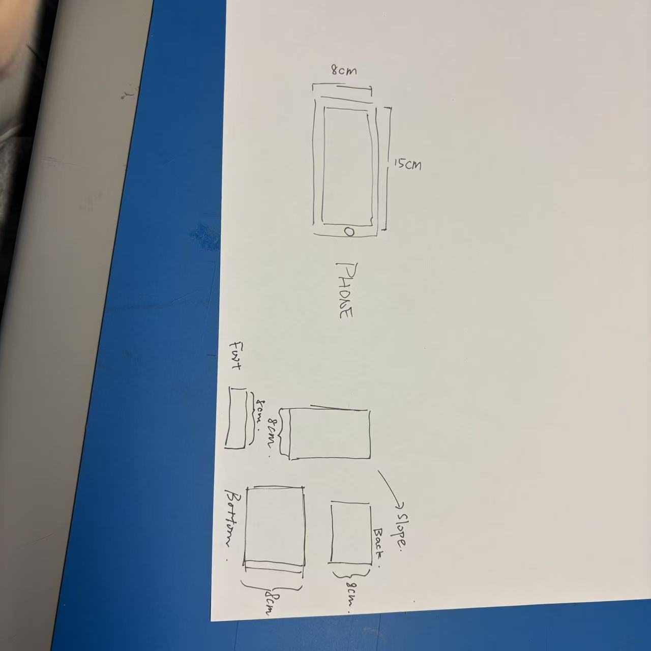 This is the design blueprint for a cardboard phone stand.