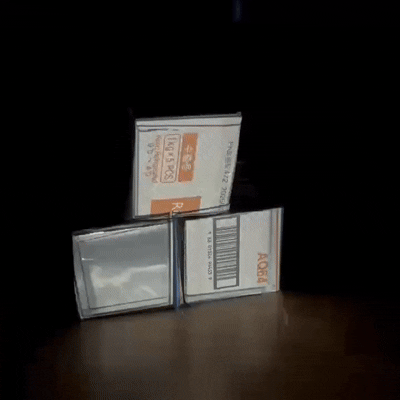 This is a GIF showing the placement and testing of assets on cardboard boxes. We aimed to create the sensation of a goldfish breaking through the physical boundaries between boxes, appearing to swim freely among three cardboard containers. This design is suitable for various modern decor applications.